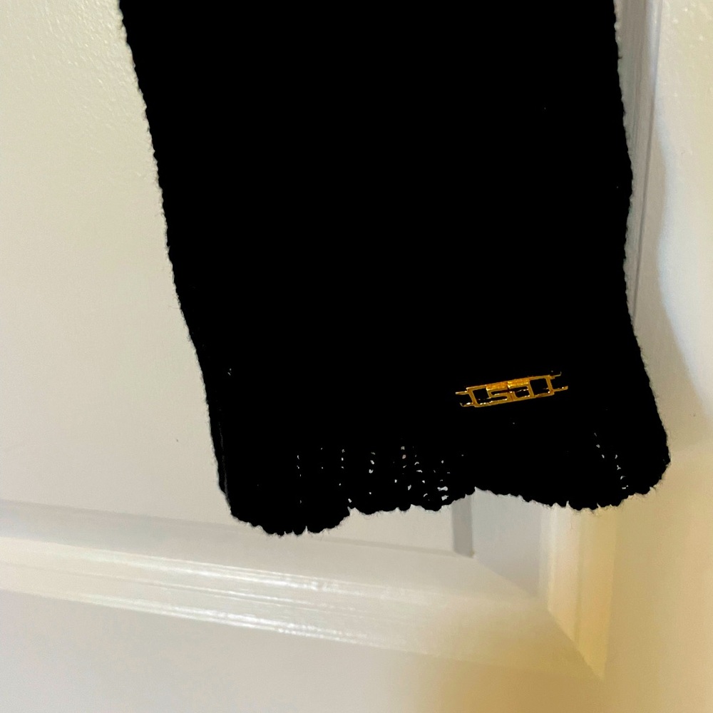 Casual black knit St John sweater longer than usual sleeve length St John logo